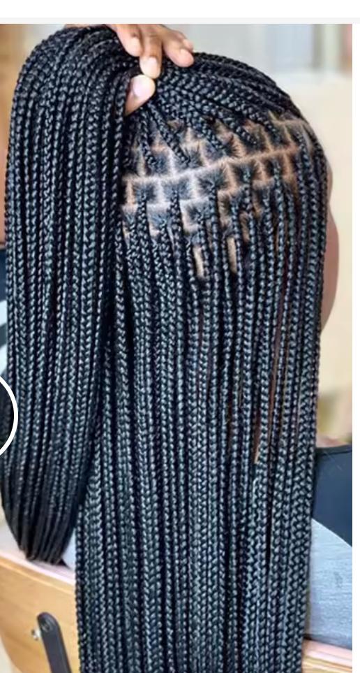 Close-up view of long finished braids